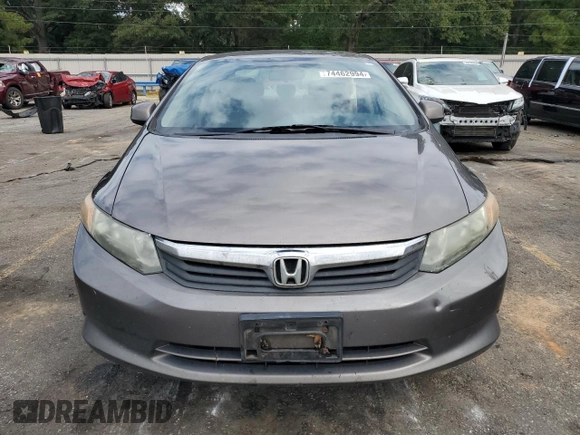 2012 Honda Civic LX z VIN 19XFB2F55CE109410, wystawiony jako Copart lot #74462994 z przebiegiem Nie podano mil oraz Szkoda całkowita • Salvage title. Historia ofert i sprzedaży dostępna na DreamBid. Obrazek 5.