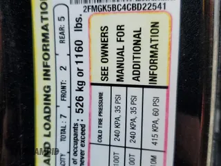 2012 Ford Flex SE z VIN 2FMGK5BC4CBD22541, wystawiony jako Copart lot #55414435 z przebiegiem 142 900 mil mil oraz Szkody całkowita. Historia ofert i sprzedaży dostępna na DreamBid. Obrazek 13.