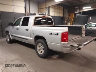 2005 Dodge Dakota SLT with VIN 1D7HW48N15S164352, listed as a IAAI auction lot 42190403 with 150,794 mi miles and . Bid and sale history available at carsss.com. Image 3.