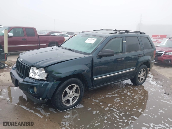 2005 Jeep Grand Cherokee Laredo with VIN 1J4GS48K45C677011, listed as a IAAI auction lot 41121018 with 210,814 mi miles. Bid and sale history available at carsss.com. Image 2.