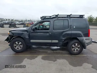 2012 Nissan Xterra S with VIN 5N1AN0NW4CC523071, listed as a IAAI auction lot 41874263 with 154,556 mi miles and . Bid and sale history available at DreamBid. Image 15.