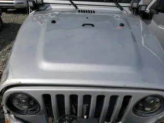 2003 Jeep Wrangler Sport with VIN 1J4FA49SX3P369375, listed as a Copart auction lot 71309184 with 0 mi miles and Salvage Title. Bid and sale history available at carsss.com. Image 11.