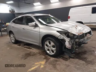 2010 Honda Crosstour EX-L z VIN 5J6TF1H52AL002179, wystawiony jako IAAI lot #41867977 z przebiegiem 145 941 mil mil oraz . Historia ofert i sprzedaży dostępna na DreamBid. Obrazek 1.