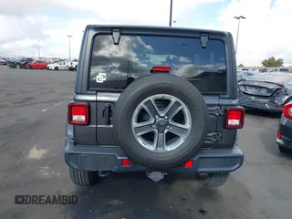 2021 Jeep Wrangler Unlimited Sahara with VIN 1C4HJXEN4MW503014, listed as a IAAI auction lot 41900234 with 16,444 mi miles and . Bid and sale history available at DreamBid. Image 16.