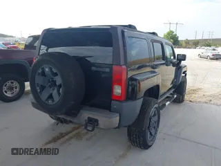 2006 Hummer H3 with VIN 5GTDN136468172236, listed as a IAAI auction lot 41971093 with 219,433 mi miles. Bid and sale history available at carsss.com. Image 4.