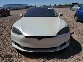 2017 Tesla Model S 60 with VIN 5YJSA1E13HF190581, listed as a Copart auction lot 57383595 with 88,219 mi miles and Salvage title. Bid and sale history available at DreamBid. Image 5.