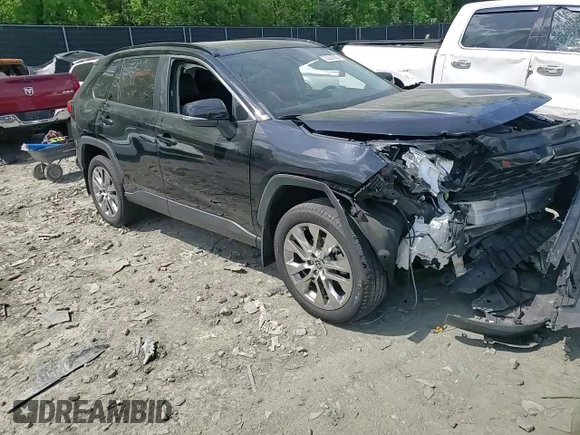 2021 Toyota RAV4 XLE Premium with VIN 2T3A1RFV3MC195877, listed as a Copart auction lot 55220955 with 92,679 mi miles and Salvage title. Bid and sale history available at DreamBid. Image 14.