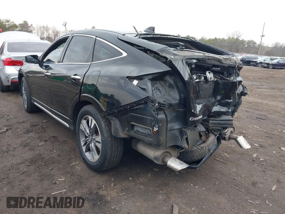 2014 Honda Crosstour EX-L z VIN 5J6TF2H57EL004084, wystawiony jako IAAI lot #42020402 z przebiegiem 116 356 mil mil oraz . Historia ofert i sprzedaży dostępna na DreamBid. Obrazek 3.