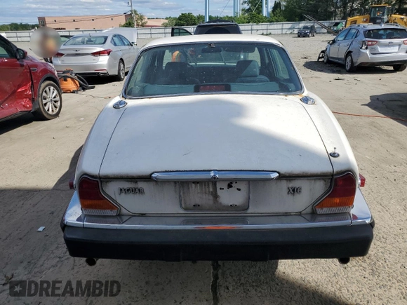 1986 Jaguar XJ z VIN SAJAV1346GC461014, wystawiony jako Copart lot #57785915 z przebiegiem 53 433 mil mil oraz Czysty tytuł • Clean title. Historia ofert i sprzedaży dostępna na DreamBid. Obrazek 6.