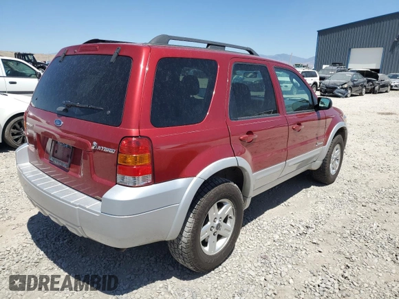 2007 Ford Escape Hybrid z VIN 1FMCU59H77KA61881, wystawiony jako Copart lot #64988665 z przebiegiem 242 536 mil mil oraz Czysty tytuł • Clean title. Historia ofert i sprzedaży dostępna na DreamBid. Obrazek 3.