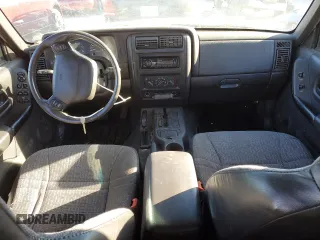 2001 Jeep Cherokee Sport z VIN 1J4FF48S71L532376, wystawiony jako Copart lot #81408644 z przebiegiem 230 058 mil mil oraz Szkoda całkowita • Salvage title. Historia ofert i sprzedaży dostępna na DreamBid. Obrazek 8.