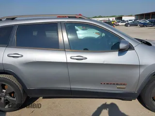 2016 Jeep Cherokee Latitude with VIN 1C4PJLCB7GW256587, listed as a IAAI auction lot 42037539 with 209,267 mi miles. Bid and sale history available at carsss.com. Image 13.