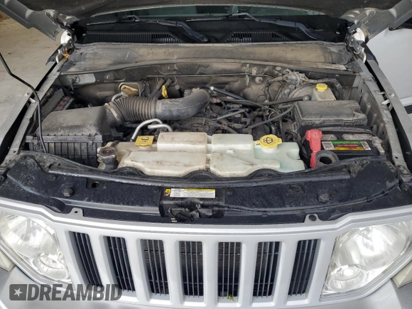 2011 Jeep Liberty Sport z VIN 1J4PN2GK6BW502136, wystawiony jako Copart lot #55778415 z przebiegiem 151 295 mil mil oraz Szkoda całkowita • Salvage title. Historia ofert i sprzedaży dostępna na DreamBid. Obrazek 12.