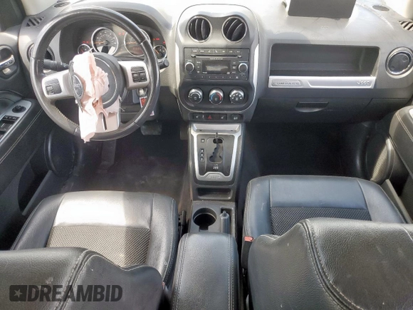 2017 Jeep Compass Latitude с VIN 1C4NJDEB2HD204646, выставлен на аукционе Copart как лот 60067345 с пробегом 145 241 миль миль и Списание • Salvage title. История ставок и продаж доступна на DreamBid. Изображение 8.