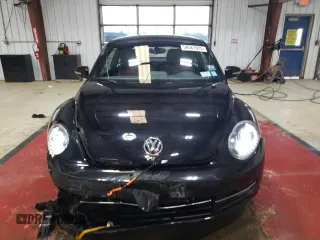2012 Volkswagen Beetle Turbo with VIN 3VWVA7AT4CM665261, listed as a Copart auction lot 50562025 with 62,570 mi miles and Salvage Title. Bid and sale history available at DreamBid. Image 5.