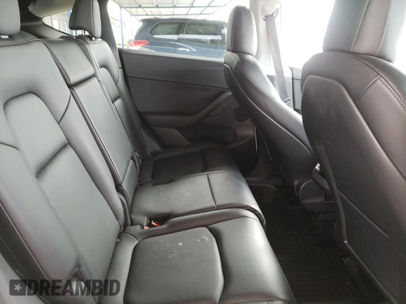 2022 Tesla Model Y Long Range with VIN 7SAYGAEE9NF384400, listed as a Copart auction lot 51961545 with 31,758 mi miles and Salvage Title. Bid and sale history available at DreamBid. Image 11.