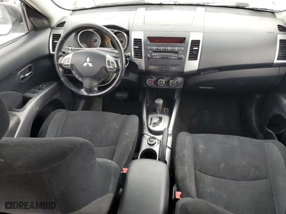 2009 Mitsubishi Outlander ES with VIN JA4LT21W59Z603189, listed as a Copart auction lot 43136585 with 419,874 mi miles and Salvage Title. Bid and sale history available at carsss.com. Image 8.