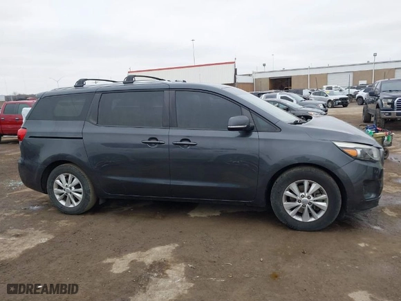 2016 Kia Sedona LX with VIN KNDMB5C17G6107373, listed as a IAAI auction lot 41555528 with 140,698 mi miles. Bid and sale history available at carsss.com. Image 13.