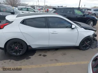 2019 Hyundai Veloster Turbo with VIN KMHTH6AB3KU020193, listed as a IAAI auction lot 41526722 with 54,697 mi miles. Bid and sale history available at carsss.com. Image 13.