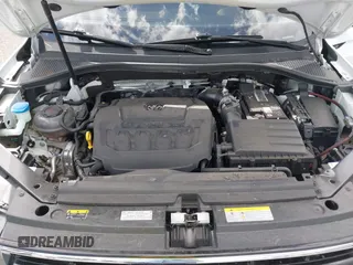 2023 Volkswagen Tiguan SE R-Line Black with VIN 3VVCB7AX3PM133002, listed as a IAAI auction lot 41902721 with 32,915 mi miles and . Bid and sale history available at DreamBid. Image 10.