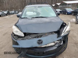 2012 Mazda 5 Touring with VIN JM1CW2CL6C0107233, listed as a IAAI auction lot 41332199 with 130,428 mi miles and . Bid and sale history available at DreamBid. Image 12.