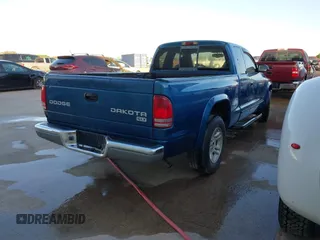 2003 Dodge Dakota SLT z VIN 1D7HL42N93S196397, wystawiony jako IAAI lot #42105857 z przebiegiem 159 690 mil mil oraz . Historia ofert i sprzedaży dostępna na DreamBid. Obrazek 4.