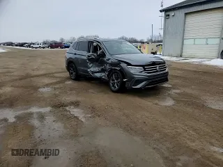 2023 Volkswagen Tiguan SE z VIN 3VVMB7AX5PM029437, wystawiony jako Copart lot #44902825 z przebiegiem 54 167 mil mil oraz Szkoda całkowita • Salvage title. Historia ofert i sprzedaży dostępna na DreamBid. Obrazek 14.