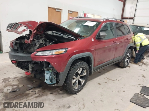 2015 Jeep Cherokee Trailhawk with VIN 1C4PJMBS7FW646577, listed as a IAAI auction lot 41404911 with 85,343 mi miles and . Bid and sale history available at DreamBid. Image 17.