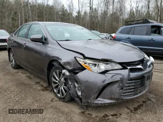 2015 Toyota Camry LE z VIN 4T1BD1FKXFU152666, wystawiony jako Copart lot #54879515 z przebiegiem 315 836 mil mil oraz Czysty tytuł • Clean title. Historia ofert i sprzedaży dostępna na DreamBid. Obrazek 4.