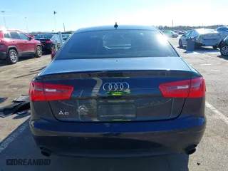 2014 Audi A6 2.0T Premium Plus with VIN WAUGFAFC4EN133050, listed as a IAAI auction lot 41625553 with 130,251 mi miles. Bid and sale history available at carsss.com. Image 16.