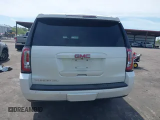2015 GMC Yukon XL SLT with VIN 1GKS1HKC0FR154518, listed as a IAAI auction lot 41905683 with 162,482 mi miles. Bid and sale history available at carsss.com. Image 16.