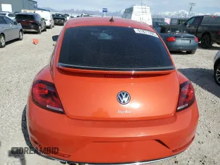 2019 Volkswagen Beetle S с VIN 3VWFD7AT9KM712147, выставлен на аукционе Copart как лот 51871395 с пробегом 39 831 миль миль и Списание • Salvage title. История ставок и продаж доступна на DreamBid. Изображение 6.