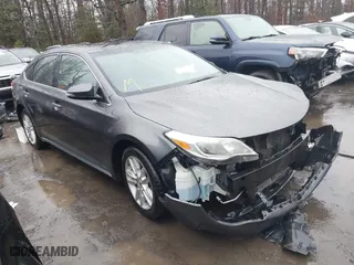 2014 Toyota Avalon Limited with VIN 4T1BK1EBXEU090451, listed as a IAAI auction lot 41453699 with 146,664 mi miles. Bid and sale history available at carsss.com. Image 1.