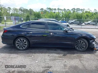 2023 Hyundai Sonata Limited z VIN KMHL34J2XPA262877, wystawiony jako IAAI lot #42450105 z przebiegiem 33 103 mil mil oraz . Historia ofert i sprzedaży dostępna na DreamBid. Obrazek 13.