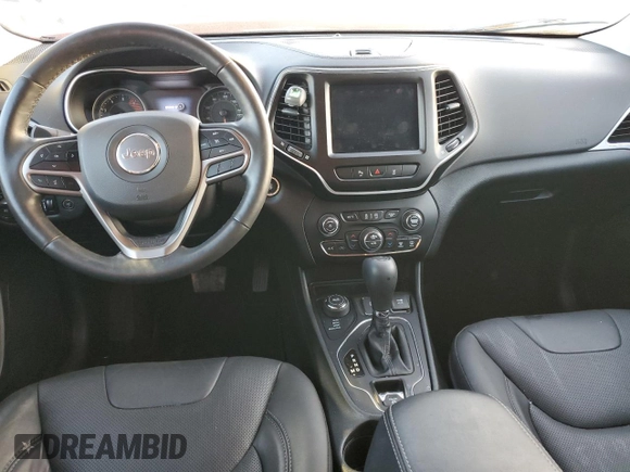 2021 Jeep Cherokee 80th Anniversary with VIN 1C4PJMMN3MD180906, listed as a Copart auction lot 48203433 with 21,700 mi miles and . Bid and sale history available at DreamBid. Image 8.