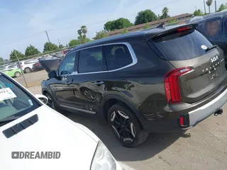 2023 Kia Telluride S with VIN 5XYP6DGC0PG334800, listed as a IAAI auction lot 42078611 with 27,486 mi miles and . Bid and sale history available at DreamBid. Image 14.