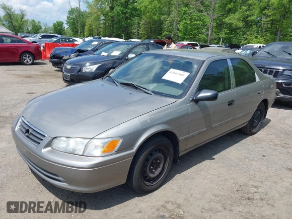 2001 Toyota Camry CE with VIN 4T1BG22KX1U072957, listed as a IAAI auction lot 42167686 with 200,126 mi miles. Bid and sale history available at carsss.com. Image 2.