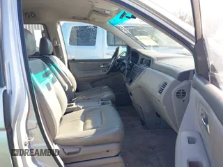 2004 Honda Odyssey EX-L with VIN 5FNRL18974B057715, listed as a IAAI auction lot 41762518 with 193,626 mi miles and . Bid and sale history available at DreamBid. Image 5.