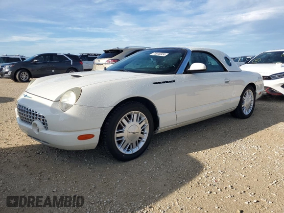 2002 Ford Thunderbird Hardtop Premium z VIN 1FAHP60A92Y103048, wystawiony jako Copart lot #73916924 z przebiegiem 75 396 mil mil oraz Szkoda całkowita • Salvage title. Historia ofert i sprzedaży dostępna na DreamBid. Obrazek 1.