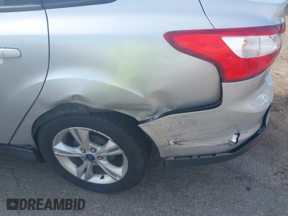 2013 Ford Focus SE with VIN 1FADP3F26DL249436, listed as a IAAI auction lot 42668702 with 79,182 mi miles and . Bid and sale history available at DreamBid. Image 6.