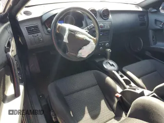 2008 Hyundai Tiburon GS z VIN KMHHM66D08U291605, wystawiony jako Copart lot #46589265 z przebiegiem 177 104 mil mil oraz Szkoda całkowita • Salvage title. Historia ofert i sprzedaży dostępna na DreamBid. Obrazek 8.