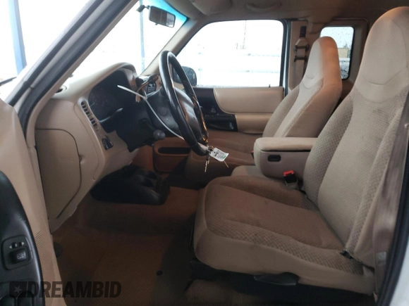 1999 Ford Ranger XLT with VIN 1FTYR14X3XPB21905, listed as a Copart auction lot 82248924 with 273,376 mi miles and Salvage Title. Bid and sale history available at DreamBid. Image 7.