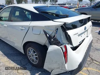 2016 Toyota Prius Four with VIN JTDKARFUXG3511034, listed as a IAAI auction lot 42137394 with 77,424 mi miles. Bid and sale history available at carsss.com. Image 6.