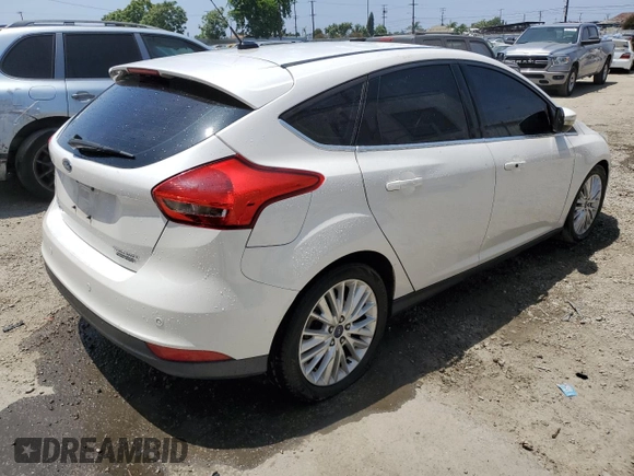2015 Ford Focus Titanium with VIN 1FADP3N23FL375368, listed as a Copart auction lot 60707305 with 153,300 mi miles and Clean title. Bid and sale history available at DreamBid. Image 3.