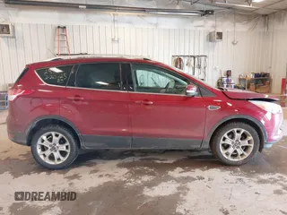 2014 Ford Escape Titanium with VIN 1FMCU0JX6EUC58726, listed as a IAAI auction lot 41656779 with 162,888 mi miles. Bid and sale history available at carsss.com. Image 13.