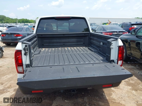 2020 Honda Ridgeline RTL with VIN 5FPYK3F51LB029859, listed as a IAAI auction lot 42462285 with 57,399 mi miles and . Bid and sale history available at DreamBid. Image 17.