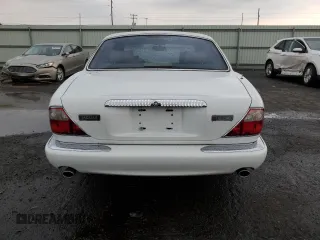 1999 Jaguar XJ with VIN SAJKD6041XC876928, listed as a Copart auction lot 60038405 with 63,917 mi miles and Clean title. Bid and sale history available at DreamBid. Image 6.