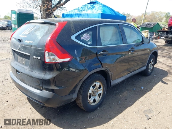 2014 Honda CR-V LX with VIN 2HKRM4H35EH607703, listed as a IAAI auction lot 42162568 with 174,238 mi miles and . Bid and sale history available at carsss.com. Image 4.