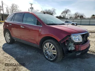 2010 Lincoln MKX with VIN 2LMDJ8JC2ABJ31128, listed as a Copart auction lot 41861205 with 56,661 mi miles and Salvage Title. Bid and sale history available at DreamBid. Image 4.