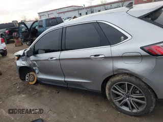 2021 Ford Edge Titanium z VIN 2FMPK4K94MBA32297, wystawiony jako IAAI lot #41834740 z przebiegiem 45 908 mil mil oraz . Historia ofert i sprzedaży dostępna na DreamBid. Obrazek 14.